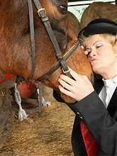 Mature slut playing with herself in a barn