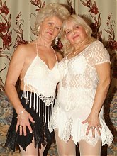 Francesca and Erlene are big boobed grandmas having a nice lesbian dildo sharing live